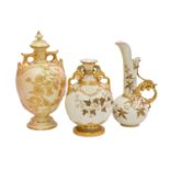 A Royal Worcester gilt embellished blush ivory twin-handled vase and cover (a.f.), 24cm high,