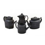 Four early 19th century black basalt teapots, including Wedgwood decorated with sprigged