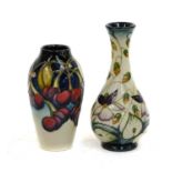 Two modern Moorcroft vases, Mediterranean Cherries and Sweet Thief, 14cm and 17cm high (boxed)