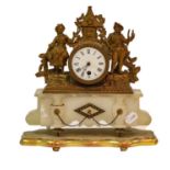 A late 19th century gilt metal and alabaster timepiece, the enamelled dial with a drum case