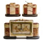 An Art Deco marble and onyx striking mantel clock garnitureCondition report: Clockcase and garniture