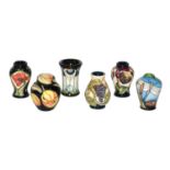 A set of six modern Moorcroft miniature vases and ginger jar, in Figaro, Violet, Poppyseeds, Art