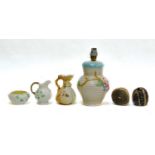 A Royal Worcester blush ivory ewer, Belleek jug and sugar bowl, Poole pottery pen holders, and a