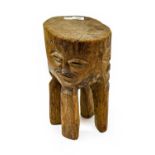 A Lundazi, Eastern Zambia Stool, made from a trunk section, the solid seat carved around the edge