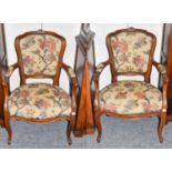 A pair of 20th century floral upholstered fauteuils (2)