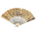 An 18th century ivory fan with silver inlaid decoration, the mount appliqued with sequins and a