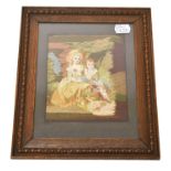 A 19th century gilt framed silk work picture of a young child feeding a lamb knelt beside its mother