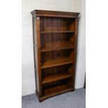 A pair of modern oak bookcases with adjustable shelves, 93cm by 34cm by 183cm