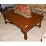 A Titchmarsh & Goodwin style oak coffee table, 132cm by 91cm by 51cm