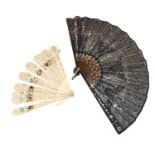 Five 19th century fans, comprising: a small bone brisee example with floral painted decoration, a