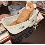 Circa 1930s Wicker Stylised Childs Pram, painted cream with circular coloured glass apertures to the