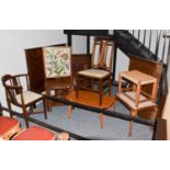 A group of furniture, comprising: two George III hanging corner cupboards, three stools, two chairs,