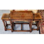 A Titchmarsh & Goodwin rectangular oak table with two square nesting tables, the largest 61cm by