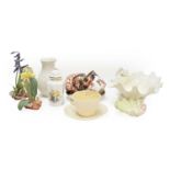 A collection of Royal Worcester including shell formed dishes, jewelled cup and saucer, Belleek