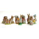 A Beswick Beatrix pottery figure 'Timmy Tiptoes', gold backstamp, together with eight Royal Albert