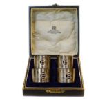 A cased set of four Irish silver napkin rings, by West and Sons, Dublin