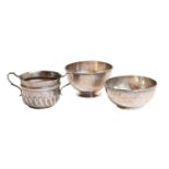 Three Silver bowls, comprising: one in the form of an early 18th-century porringer, by John Edward