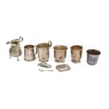 A Victorian silver christening mug by H.J. Lias & Son, London, 1871; together with four other
