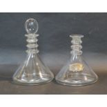 A Matched Set of Four Glass Ships' Decanters and Three Stoppers, with bull's eye knops and triple