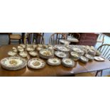 A large Palissy Game dinner service, including dinner plates, side plates, tea wares, cake stand,