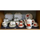 A Wedgewood Susie Cooper Corn Poppy coffee set, together with a Wellington China teaset (one shelf)