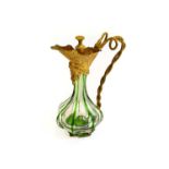A Gilt-Metal Mounted Glass Scent-Bottle, the green and clear glass bottle in the form of a ewer,