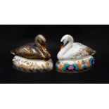 Royal Crown Derby Imari paperweights; Golden Jubilee Black Swan (certificate) and another Swan (gold