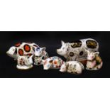 Royal Crown Derby Imari paperweights; Spotty Pig (certificate), Plumstead Piglet, another similar,