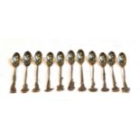 A set of eleven Tiffany floral demitasse spoons