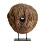 A well weathered reclaimed wood pulley type sculpture, together with a driftwood sculpture on a