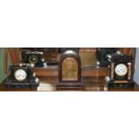 A German mahogany cased eight day striking mantel clock housing a three train movement; together