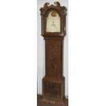 A carved oak eight-day longcase clock, 13'' arch painted dial, (later case)Condition report: With