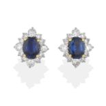 A Pair of 18 Carat Gold Sapphire and Diamond Cluster Earrings