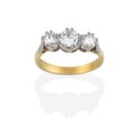^ A Diamond Three Stone Ring