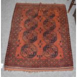 Afghan Turkmen rug, the terracotta field with two rows of elephant foot guls enclosed by borders
