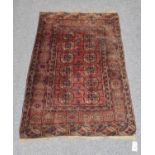 Tekke rug, the field with two columns of guls enclosed by multiple borders, 145cm by 97cm