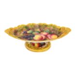 {} A Royal Worcester Porcelain Oval Dish, painted by Thomas Lockyer, 1931, painted with a still life