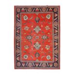 Sultanabad Carpet West Iran, 20th centuryThe raspberry field sparsely decorated with large