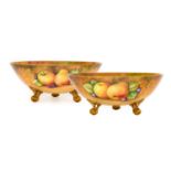 {} A Pair of Coalport Porcelain Bowls, 20th century, of circular form, decorated with still lifes of