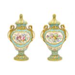 {} A Pair of Sèvres Style Porcelain Vases and Covers, 19th century, of baluster form, painted with