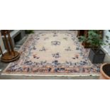 Chinese Carpet, 20th centuryThe pale mushroom field sparsely decorated with exotic birds and