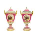 {} A Pair of Berlin Porcelain Vases and Covers, late 19th century, of twin-handled baluster form,