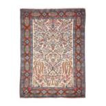 Ghom Rug Central Iran, circa 1950 The ivory field with a oneway design of birds and scrolling