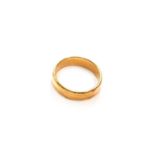 An 18 carat gold band ring, finger size UGross weight 7.8 grams.