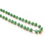 A graduated jade bead necklace, knotted to a clasp stamped '9CT', length 83cm (a.f.)Gross weight