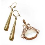 A 9 carat gold fob, length 3.7cm; and a pair of drop earrings, length 5.5cm, with hook fittingsFob -