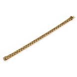 A 9 carat gold brick link bracelet, length 18.5cmGross weight 16.8 grams.
