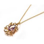 An amethyst and split pearl pendant on chain, pendant length 3.9cm, chain length 40.5cmPendant