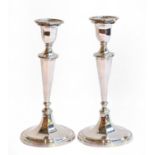 A pair of Elizabeth II Silver Candlesticks, by C. J Vander, Sheffield, 1964, each on fluted circular