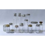 A set of Seven Victorian Silver-Mounted Cut-Glass Dressing-Table Jars, by Wolfsky and Co. Ltd.,